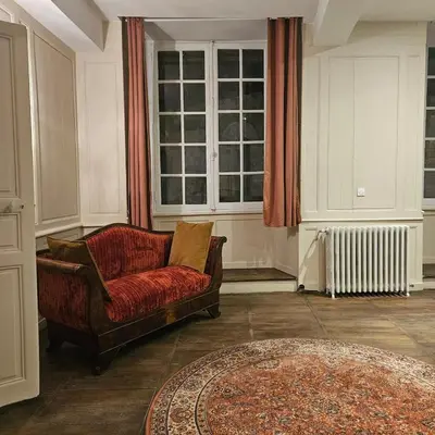 Coin salon dans l'établissement Gite Maison Loyac