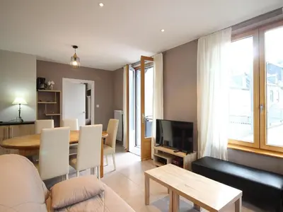 Coin salon dans l'établissement Bel F3 au Mont-Dore avec terrasse, parking et wifi - FR-1-415-160