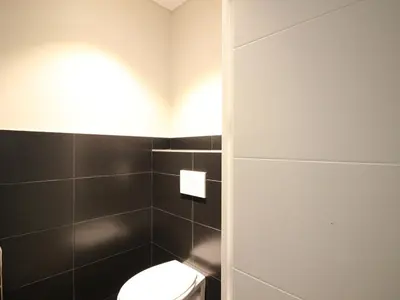 Salle de bains dans l'établissement Bel F3 au Mont-Dore avec terrasse, parking et wifi - FR-1-415-160