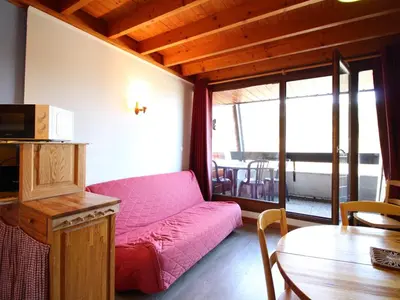 Coin salon dans l'établissement Duplex F2 au Mont-Dore avec Garage Privé - FR-1-415-167
