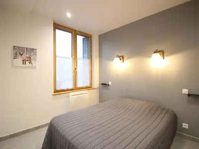 Un ou plusieurs lits dans un hébergement de l'établissement Confortable F2 avec parking privé et Wi-Fi, 4 couchages - FR-1-415-163