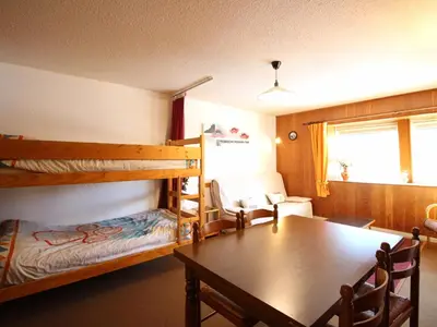 Un ou plusieurs lits dans un hébergement de l'établissement Appartement F2 au pied des pistes, 6 couchages, Mont-Dore - FR-1-415-175