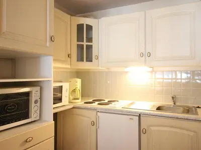 Cuisine ou kitchenette dans l'établissement Appartement F2 au pied des pistes, 6 couchages, Mont-Dore - FR-1-415-175