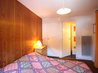 Un ou plusieurs lits dans un hébergement de l'établissement Appartement F2 au pied des pistes, 6 couchages, Mont-Dore - FR-1-415-175