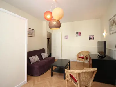 Coin salon dans l'établissement Appartement F2 avec terrasse et jardinet, proche centre Mont-Dore - FR-1-415-182