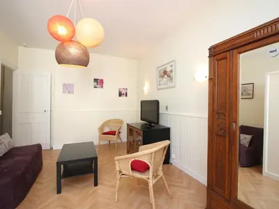 Coin salon dans l'établissement Appartement F2 avec terrasse et jardinet, proche centre Mont-Dore - FR-1-415-182