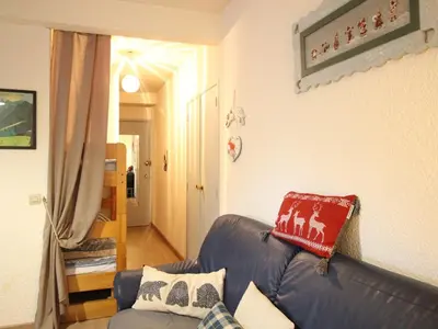 Coin salon dans l'établissement Appartement centre Mont-Dore, 4 personnes, ascenseur - FR-1-415-184