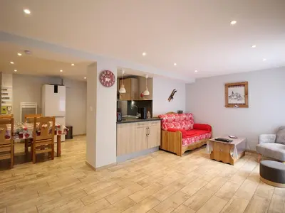 Cuisine ou kitchenette dans l'établissement Appartement T2 de charme au Mont-Dore avec parking et wifi - FR-1-415-176