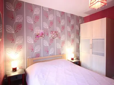 Un ou plusieurs lits dans un hébergement de l'établissement Appartement F3 WiFi au Mont-Dore, proche centre et thermes - FR-1-415-183