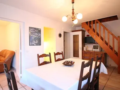 Cuisine ou kitchenette dans l'établissement Duplex spacieux au Mont-Dore avec parking privé - FR-1-415-177