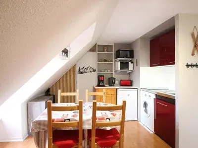 Cuisine ou kitchenette dans l'établissement Appartement F1 bis au centre avec WIFI, animaux acceptés - FR-1-415-198