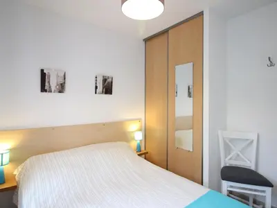 Un ou plusieurs lits dans un hébergement de l'établissement Appartement F4 au 2ème étage, proche centre, WIFI, 6 couchages - FR-1-415-191