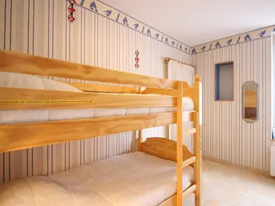 Un ou plusieurs lits dans un hébergement de l'établissement Appartement F2 bis de 50m² au centre, 4 pers., animaux admis, WiFi - FR-1-415-178