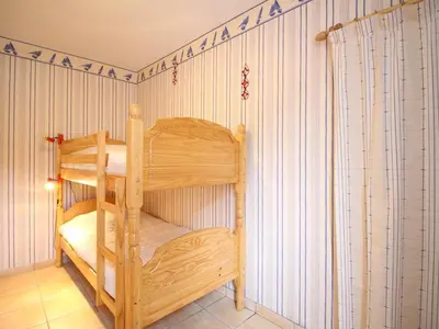 Un ou plusieurs lits dans un hébergement de l'établissement Appartement F2 bis de 50m² au centre, 4 pers., animaux admis, WiFi - FR-1-415-178