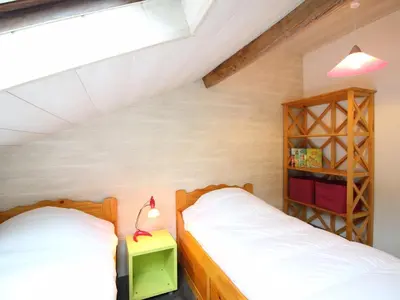 Un ou plusieurs lits dans un hébergement de l'établissement Mont-Dore: F3 40m², Parking, 4 Pers, Près Thermes - FR-1-415-197
