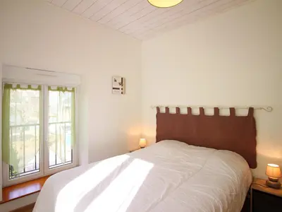 Un ou plusieurs lits dans un hébergement de l'établissement Appartement 55m² centre Mont-Dore, 2 chambres, parking, animaux admis - FR-1-415-194