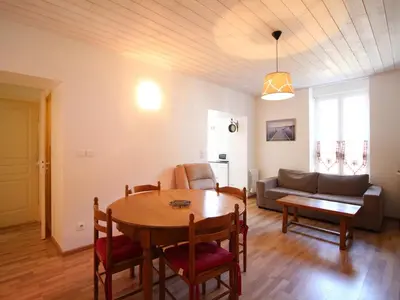 Coin salon dans l'établissement Appartement 55m² centre Mont-Dore, 2 chambres, parking, animaux admis - FR-1-415-194
