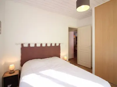 Un ou plusieurs lits dans un hébergement de l'établissement Appartement 55m² centre Mont-Dore, 2 chambres, parking, animaux admis - FR-1-415-194