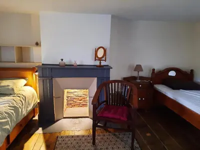 Un ou plusieurs lits dans un hébergement de l'établissement Authentique maison de Dordogne La Maison de Maitre