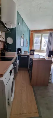 Cuisine ou kitchenette dans l'établissement Cocon Oscar et Petrus au Lioran