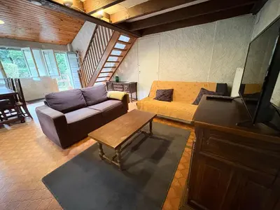 Coin salon dans l'établissement Maison Usclade Murat-le-Quaire