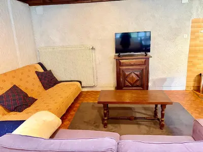 Télévision ou salle de divertissement dans l'établissement Maison Usclade Murat-le-Quaire