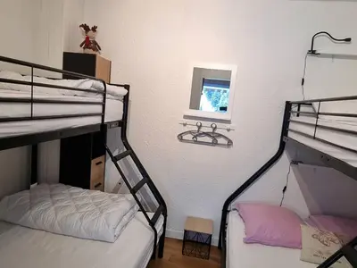 Un ou plusieurs lits dans un hébergement de l'établissement Charmant T2 rénové avec balcon au Lioran - FR-1-787-135