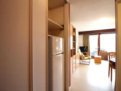 Télévision ou salle de divertissement dans l'établissement Mont-Dore: T2 bis avec balcon et parking proche centre - FR-1-415-205