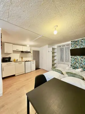 Cuisine ou kitchenette dans l'établissement Studio cosy rue des Petites Tuilières - DABNB