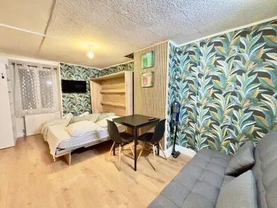 Un ou plusieurs lits dans un hébergement de l'établissement Studio cosy rue des Petites Tuilières - DABNB