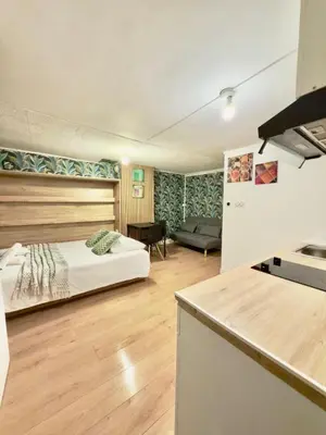 Un ou plusieurs lits dans un hébergement de l'établissement Studio cosy rue des Petites Tuilières - DABNB