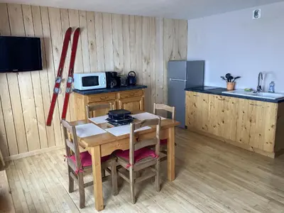 Cuisine ou kitchenette dans l'établissement Studio montagne