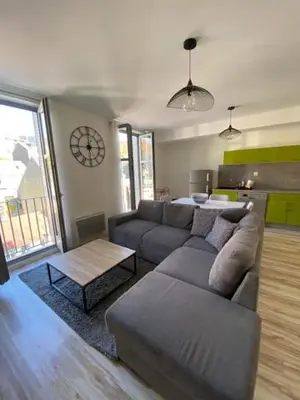 Coin salon dans l'établissement Appartement en plein centre de la Bourboule avec parking privé