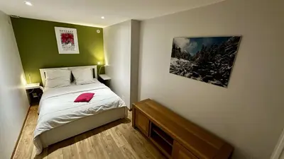 Un ou plusieurs lits dans un hébergement de l'établissement Le Loft