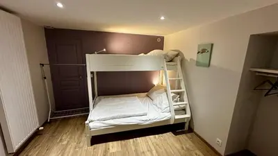 Un ou plusieurs lits dans un hébergement de l'établissement Le Loft