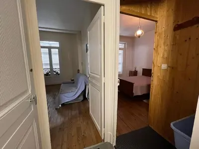 Un ou plusieurs lits dans un hébergement de l'établissement Appartement familial pour 4 au cœur de La Bourboule - FR-1-858-34