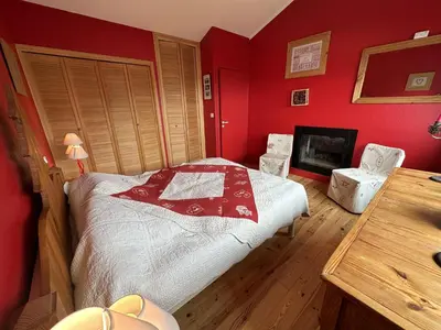Un ou plusieurs lits dans un hébergement de l'établissement Appartement esprit montagne
