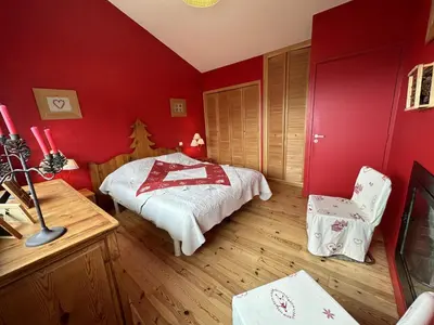 Un ou plusieurs lits dans un hébergement de l'établissement Appartement esprit montagne