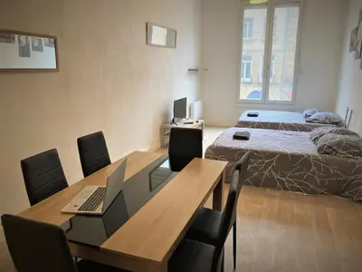 Un ou plusieurs lits dans un hébergement de l'établissement Appartement triple dans le centre de Limoges