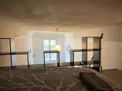 Un ou plusieurs lits dans un hébergement de l'établissement Appartement triple dans le centre de Limoges