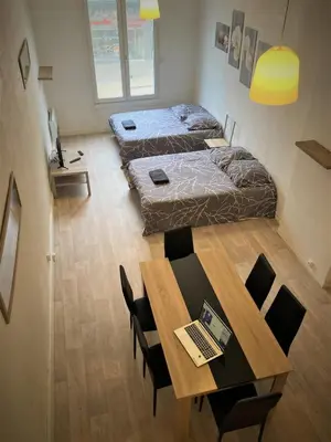 Un ou plusieurs lits dans un hébergement de l'établissement Appartement triple dans le centre de Limoges