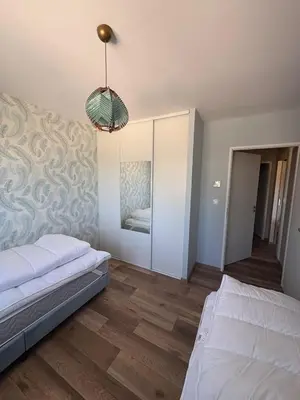 Un ou plusieurs lits dans un hébergement de l'établissement Maison de campagne en Périgord