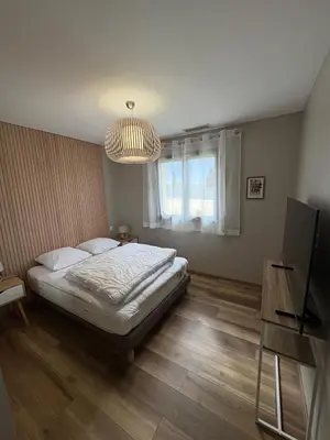 Télévision ou salle de divertissement dans l'établissement Maison de campagne en Périgord