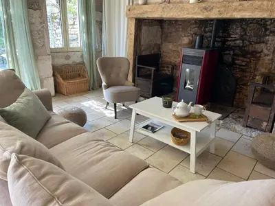 Coin salon dans l'établissement La Villa Enjoy a Lot - Maison de Campagne dans le