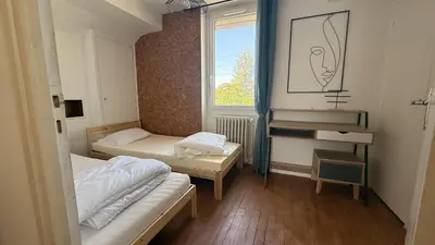 Un ou plusieurs lits dans un hébergement de l'établissement La Villa Montalat - Jolie et Calme