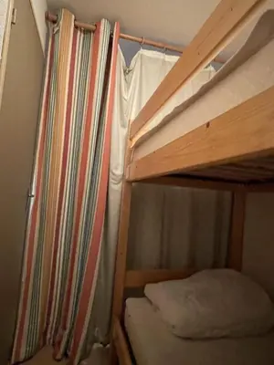 Un ou plusieurs lits dans un hébergement de l'établissement Studio porte du sud