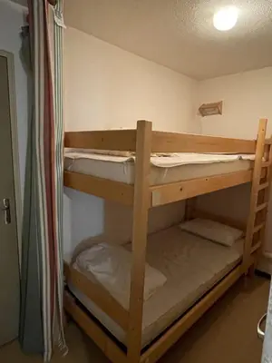 Un ou plusieurs lits dans un hébergement de l'établissement Studio porte du sud
