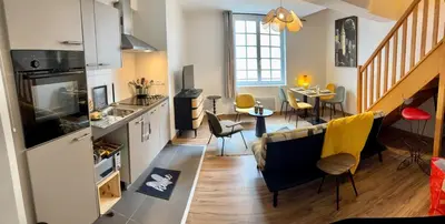 Coin salon dans l'établissement Le Saint Michel-Duplex-Hyper centre