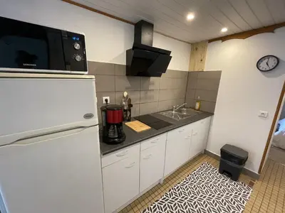 Cuisine ou kitchenette dans l'établissement T2 Vassiviere