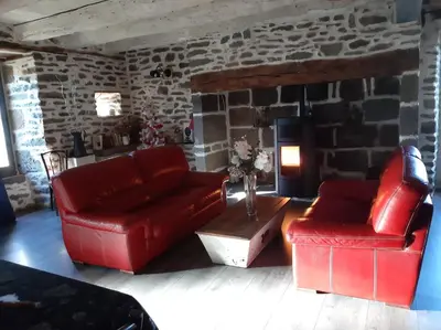 Coin salon dans l'établissement Gite La chaumière
